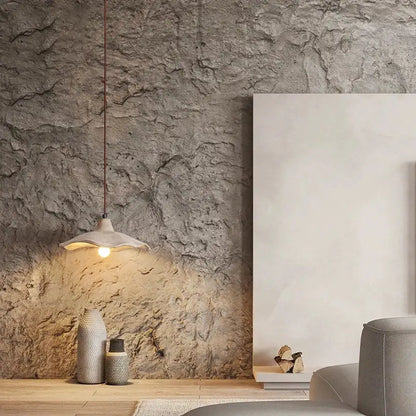 Minimalist pendant chandelier with a matte off-white ceramic shade and copper wire suspension for concrete ceiling hanging