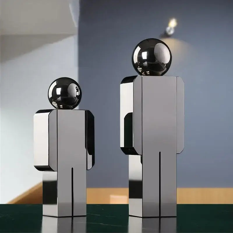 Two minimalist metallic decorbites crystal man statues with reflective chrome sphere heads for modern living room decor