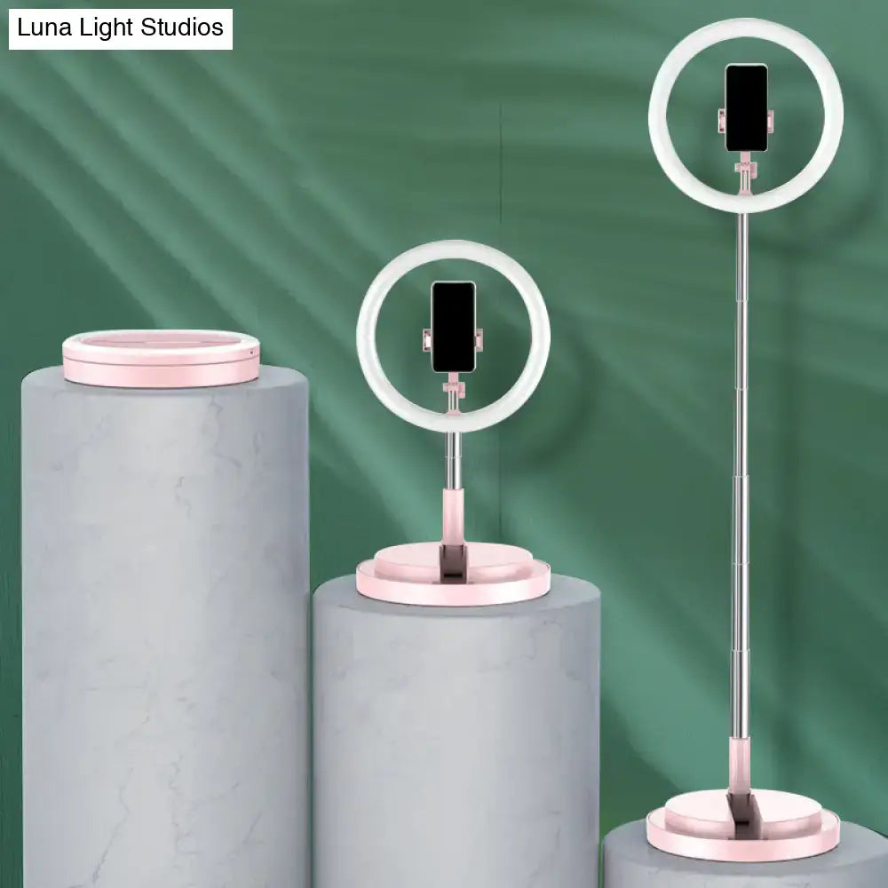 Minimalist pink and silver circular metal mobile phone vanity wall light with adjustable stand for 110v-120v use