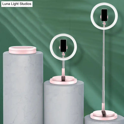 Minimalist pink and silver circular metal mobile phone vanity wall light with adjustable stand for 110v-120v use