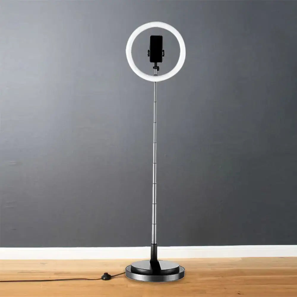 Silver minimalist circular metal mobile phone vanity light with adjustable stand and 110v-120v power for bedroom use