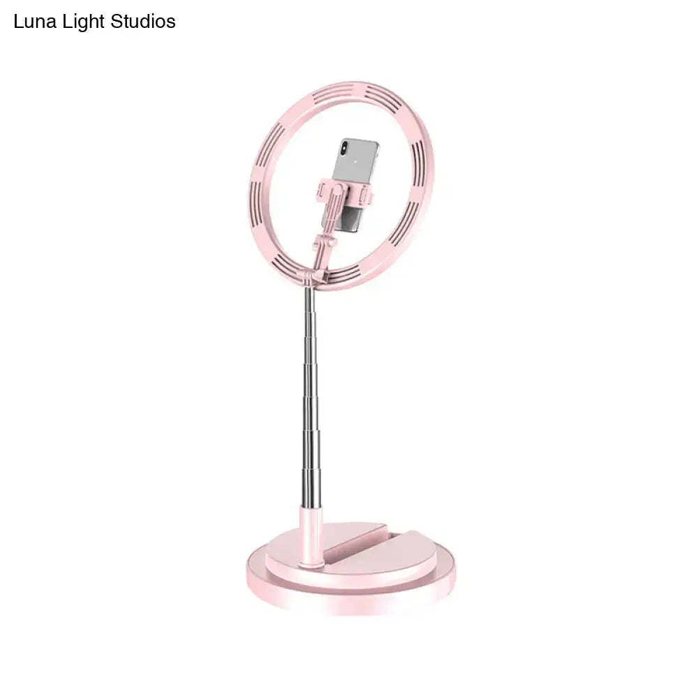 Pink minimalist circular metal mobile phone vanity wall light with adjustable stand for 110v-120v use