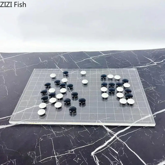 Clear acrylic go board with black and white stones as a minimalist decorbites geometric chess set for living room decor