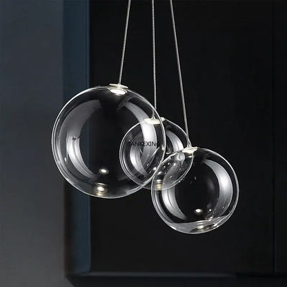 Minimalist clear glass bubble led pendant light with spherical design for dining room decorbites glass bubble led lighting