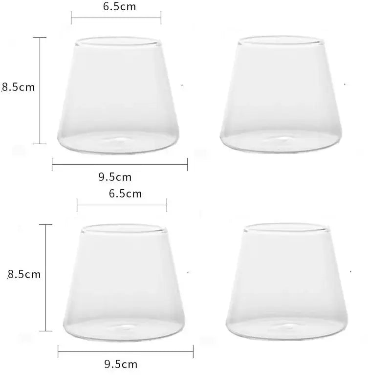 Minimalist clear glass water cup with tapered conical shape and smooth transparent surfaces for kitchen and dining room