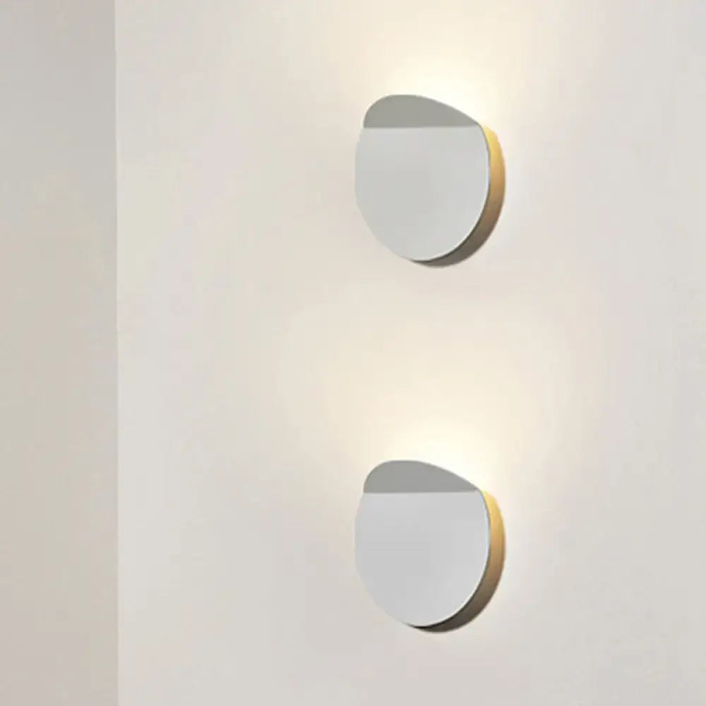 Minimalist copper sconce light wall mount with sleek white and gold finish featuring an led bulb for bedroom use