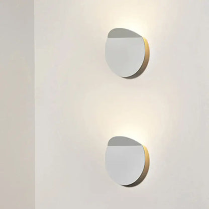 Minimalist copper sconce light wall mount with sleek white and gold finish featuring an led bulb for bedroom use