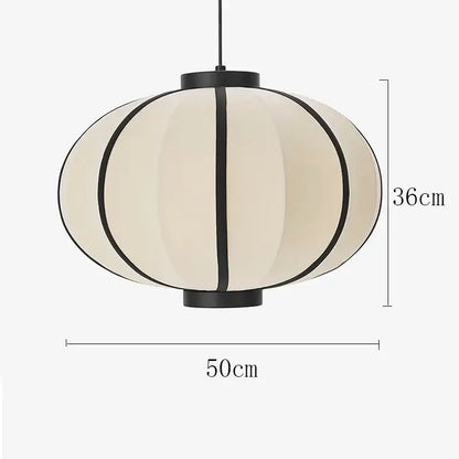 Minimalist cream and black geometric pendant light with segmented paper shade and metal fixture by decorbites danish pendant