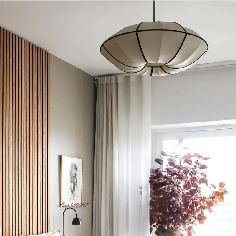 Minimalist cream and black pleated fabric pendant light with geometric trim ideal for dining room decorbites danish pendant light