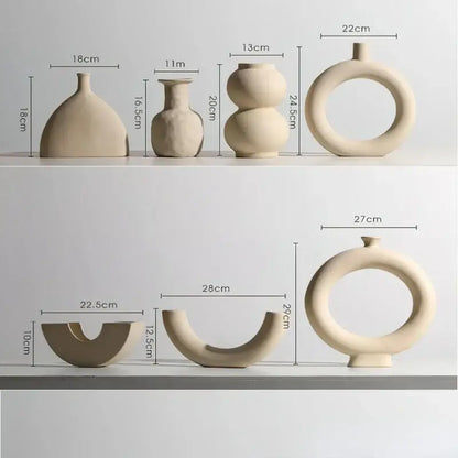 Minimalist cream ceramic art vase with abstract shapes by decorbites ceramic art for living room sculptural decor
