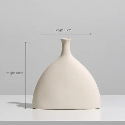 Minimalist cream ceramic art vase with a sleek bulbous body and slender neck for living room decorbites ceramic art decor