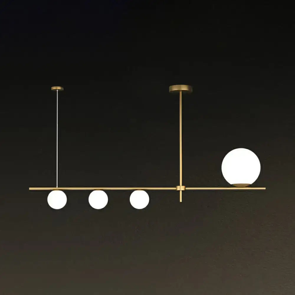 Modern brass cream glass globe island pendant light with frosted bulbs for dining room by DecorBites™