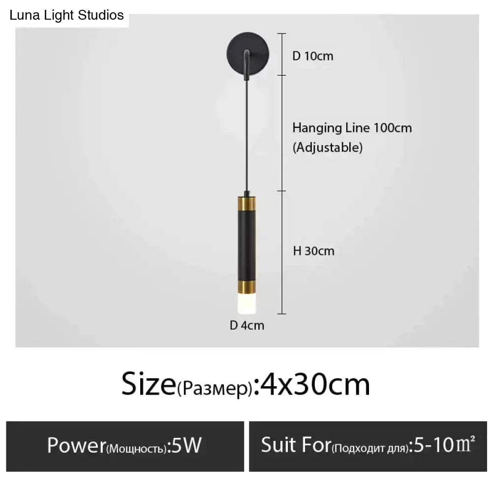 Minimalist creative luxury black and gold cylindrical bedside wall lamp with white led bulb for luxury bedroom use