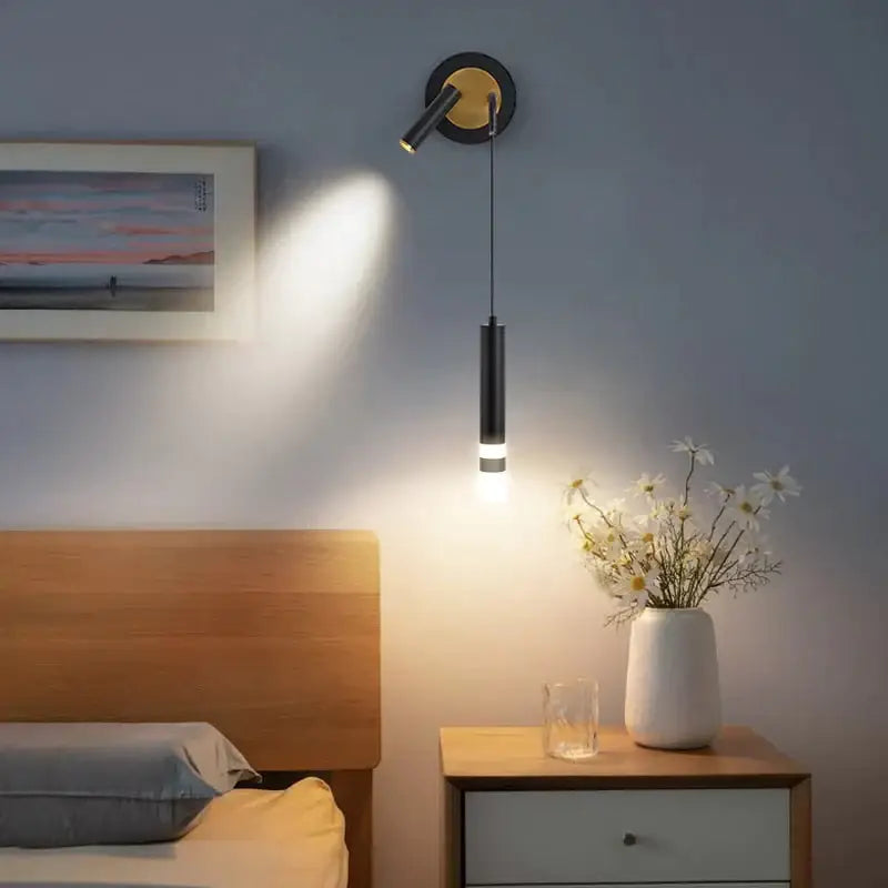 Minimalist creative luxury black and gold bedside wall lamp with cylindrical pendant and adjustable spotlight for bedroom