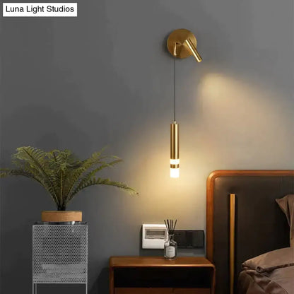 Gold-toned cylindrical wall sconce with adjustable arm for minimalist creative luxury bedroom bedside lighting