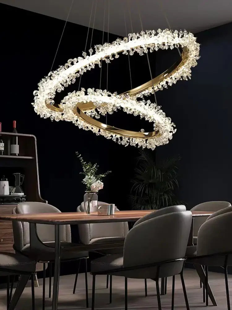 Gold-toned double-ring chandelier with sparkling clear crystals for dining room decorbites crystal gold black design
