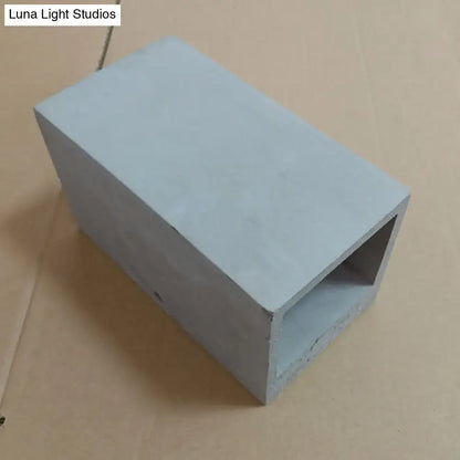 Light gray cube cuboid cement minimalistic flush mount wall light with hollow center for stairs use