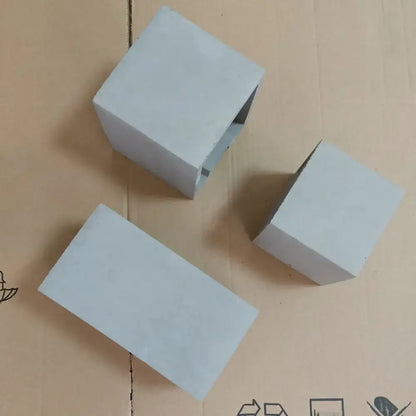 Minimalist light gray cube cuboid cement flush mount wall light with rectangular foam blocks for stairs