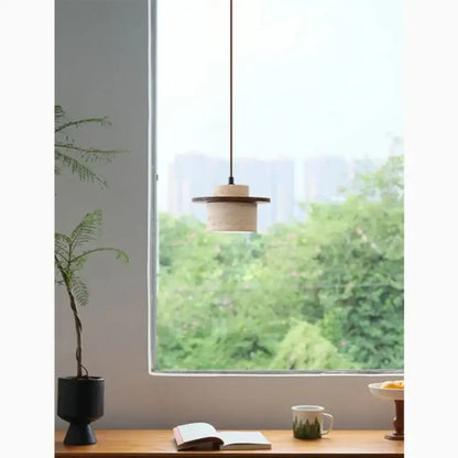 Minimalist pendant lamp with beige concrete body and dark wood accents decorbites led yellow travertine for dining room