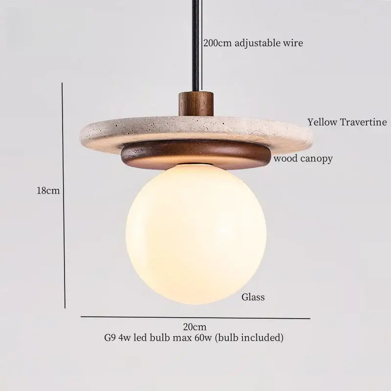 A minimalist pendant lamp featuring a warm glass globe, decorbites led yellow travertine disc, and wood canopy