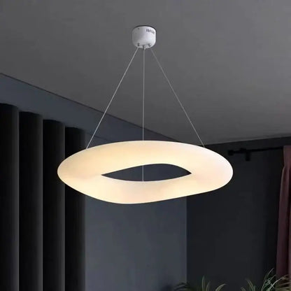 Minimalist frosted white cloud led pendant light with a soft acrylic ring and sleek ceiling mount for home office decorbites cloud led