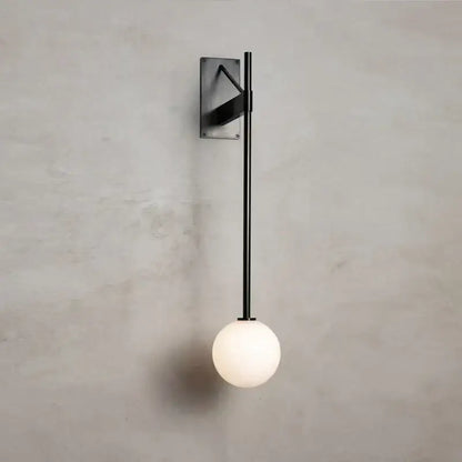 Black metal minimalist geometric iron wall lamp with rectangular plate and white glass globe for bedroom decorbites geometric iron wall