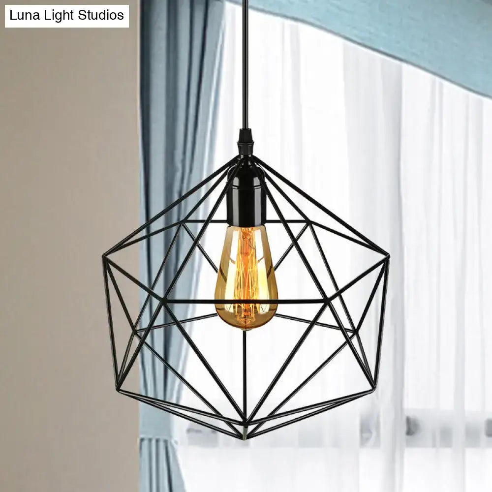 Black geometric metal pendant light with warm amber filament bulb in wireframe cage for industrial living room decor