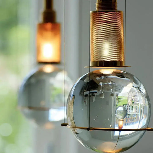 DecorBites™ minimalist globe crystal shade hanging lamp with brass mesh diffuser and metallic accents for living room