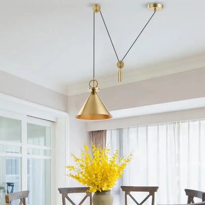 Minimalist gold conical pendant light with brass finish and black cord suspension for decorbites adjustable linear pendant lighting
