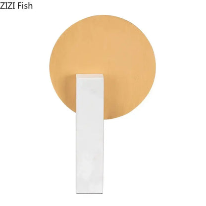 Minimalist wall sconce with matte beige circular backplate and white rectangular arm for marble base desk decoration