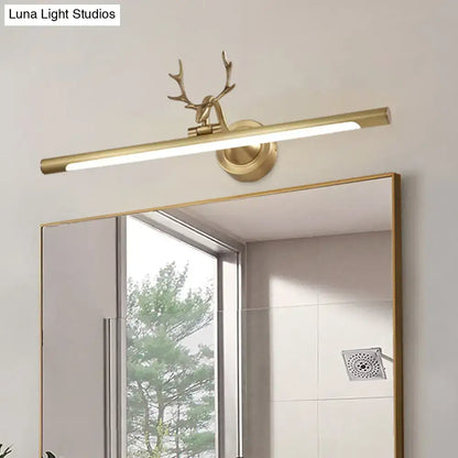 Gold-toned minimalist gold bar wall sconce light with antler arm and rectangular led bar for bathroom vanity