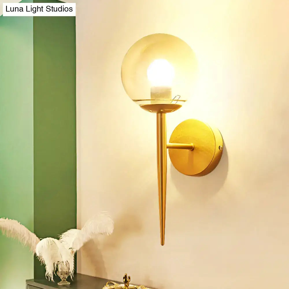 Minimalist gold and black wall sconce with clear glass globe and slender pencil arm compatible with e26 e27 bulbs
