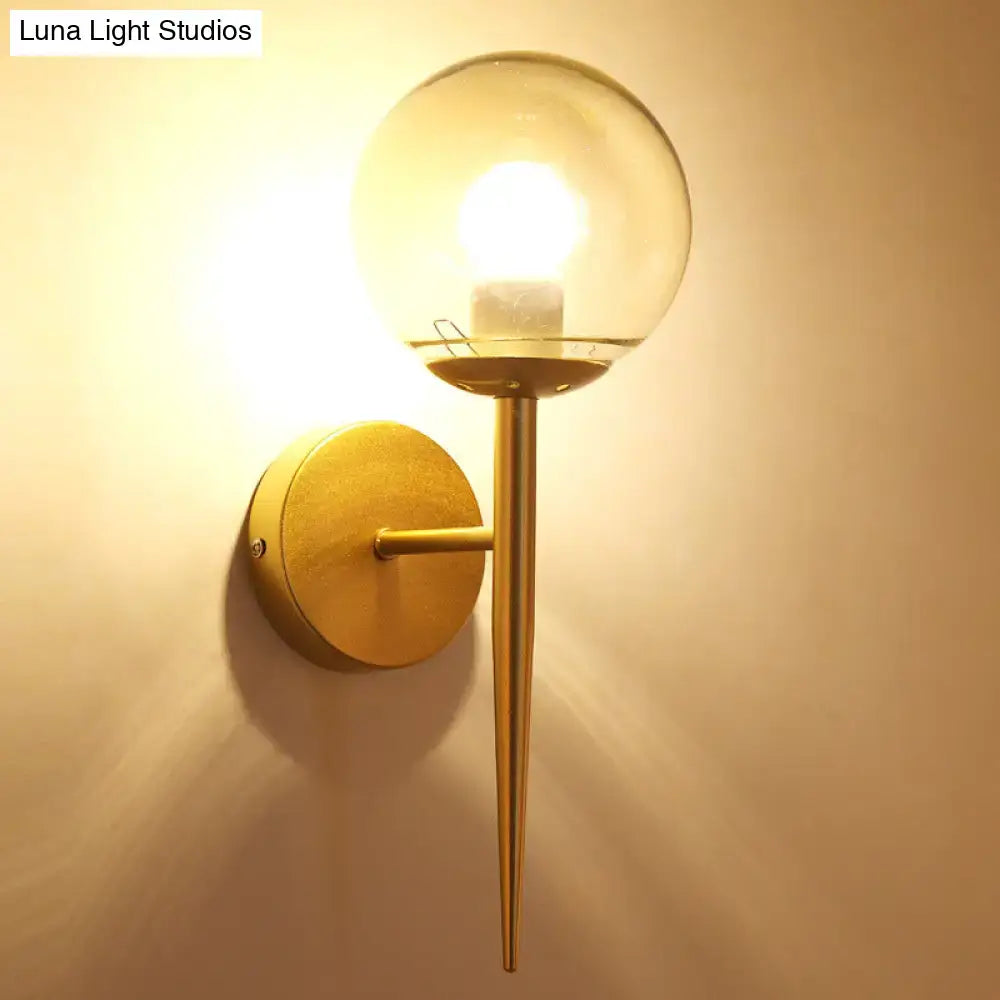 Minimalist gold wall sconce with clear glass globe and pencil arm for living room compatible with e26 e27 bulbs