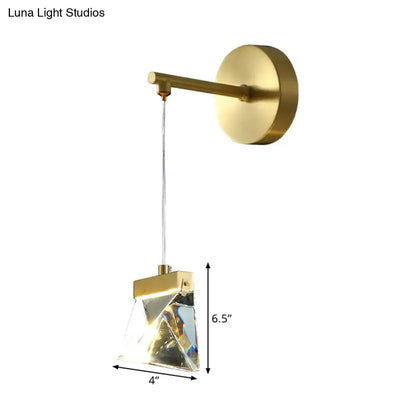 A modern minimalist gold wall lamp with clear crystal glass shade designed for 220v-240v bedroom lighting