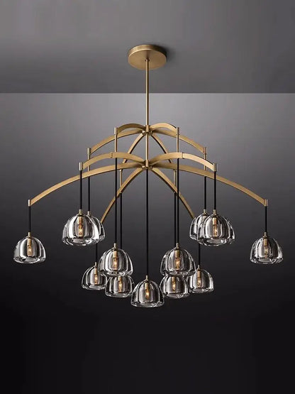 A modern minimalist gold crystal chandelier with brass and clear glass globes for dining room decorbites k9 crystal lighting