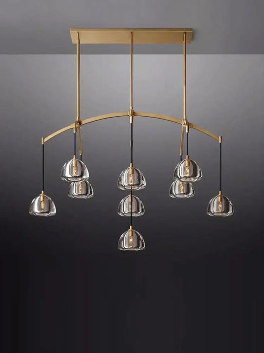 Minimalist gold crystal chandelier lighting with clear glass pendant shades and curved design for dining room decorbites k9 crystal