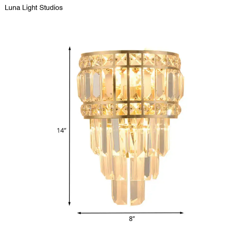 Gold-toned minimalist wall lamp with cascading crystal prisms 3-light 12 inch fixture for living room lighting