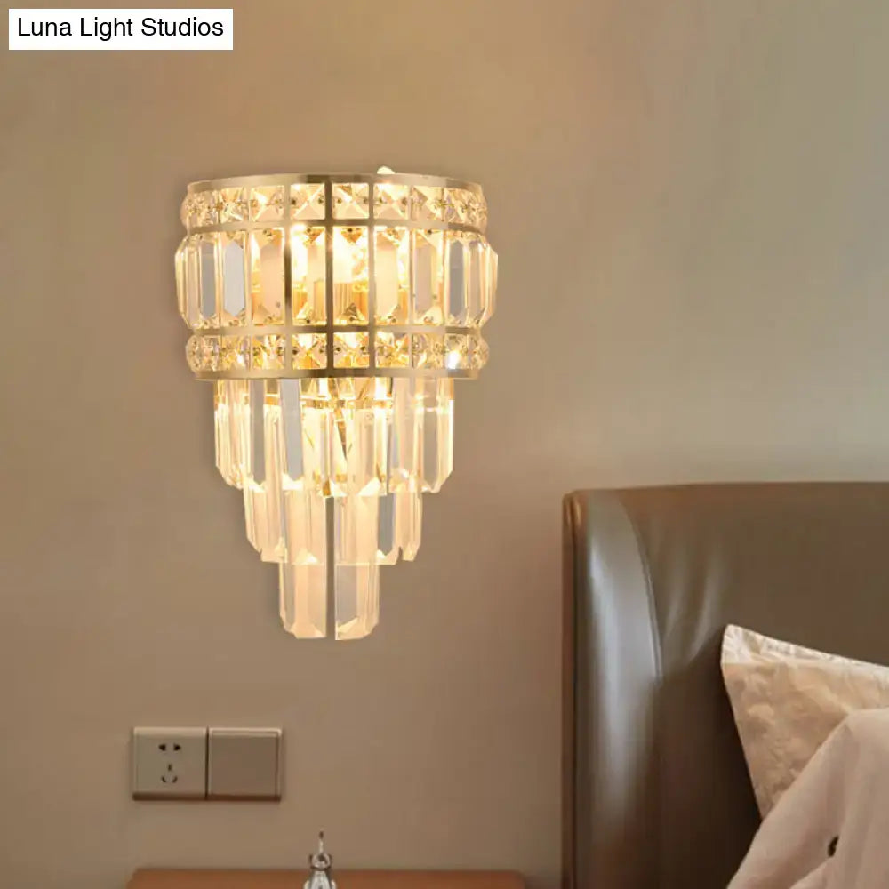 Minimalist gold crystal wall lamp with cascading clear prisms in tiered rows 3-light 12 inch fixture for living room