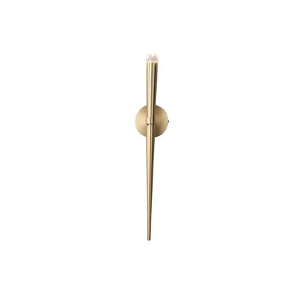 A minimalist gold crystal wall sconce with a slender gold-toned metal body and circular backplate for bedroom decorbites crystal minimalist lighting