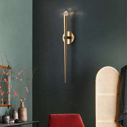 Minimalist gold crystal wall sconce with slender design and clear crystal accent for bedroom decorbites crystal minimalist lighting