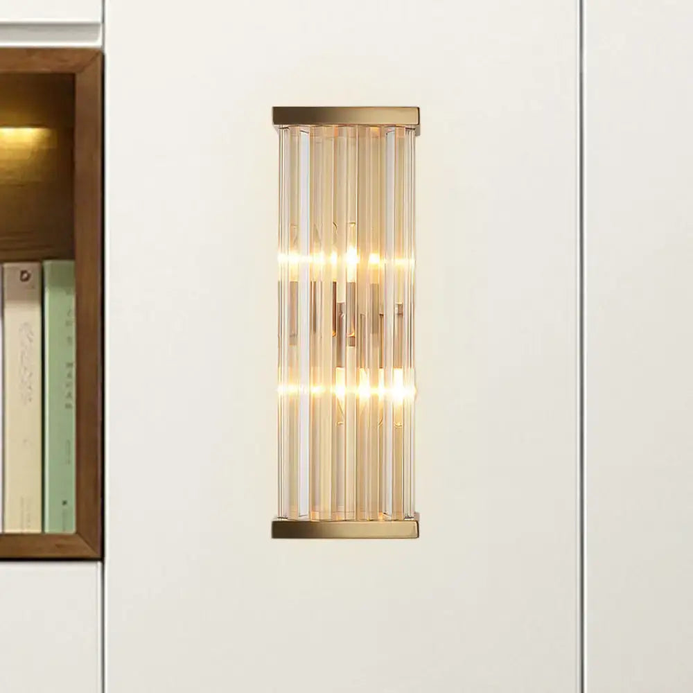 Minimalist gold crystal wall sconce with vertical rods and brass frame compatible with e12 e14 bulbs for living rooms