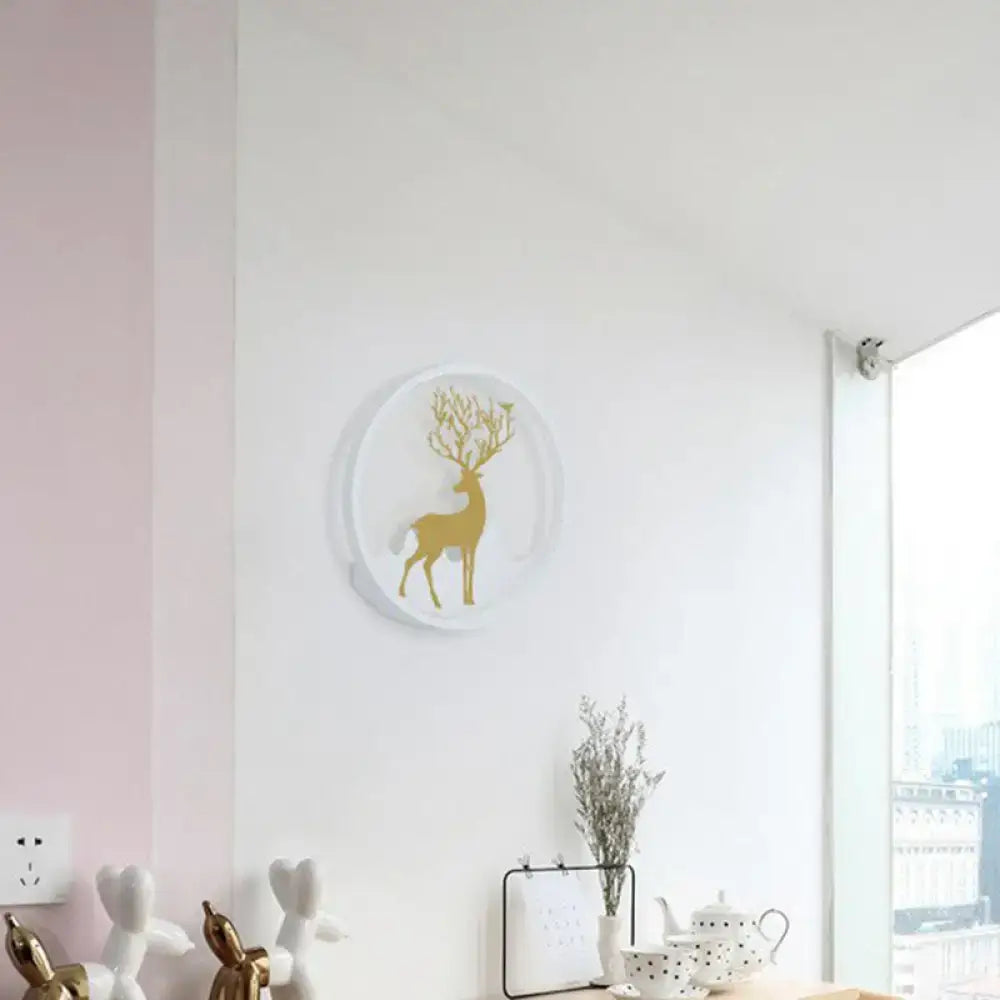 Minimalist gold deer silhouette wall decor with antlers in a 10 inch fixture circular white frame wall sconce