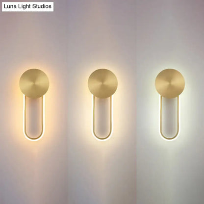 Minimalist gold elliptical wall sconce light with circular top and curved led strips for modern bedroom lighting