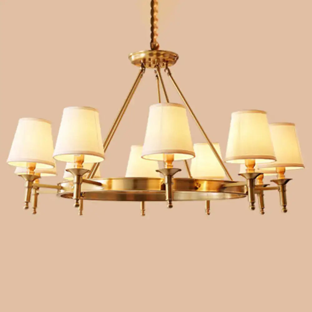 Minimalist gold fabric bedroom conical ceiling chandelier with six cream-colored fabric shades and brass finish