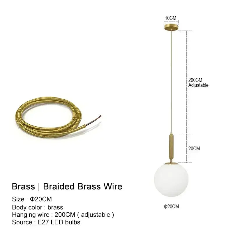 Minimalist gold-toned brass pendant chandelier with decorbites glass ball led and braided wire for kitchen island decor