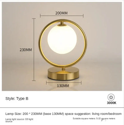 Minimalist gold-toned glass ball led table lamp with frosted globe and metal frame for bedroom decorbites decorbites glass ball table lamp