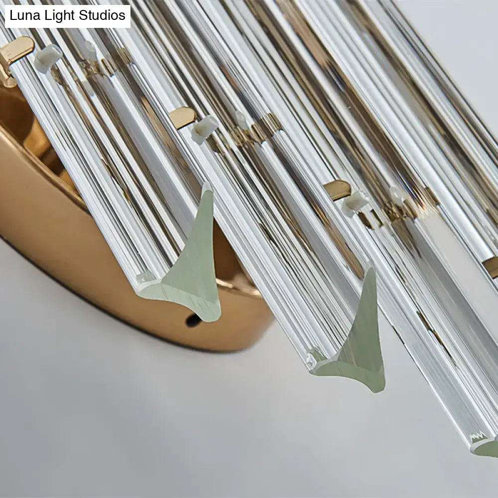 Minimalist gold K9 crystal wall sconce light with clear glass rods and green-tinted triangular ends for living room