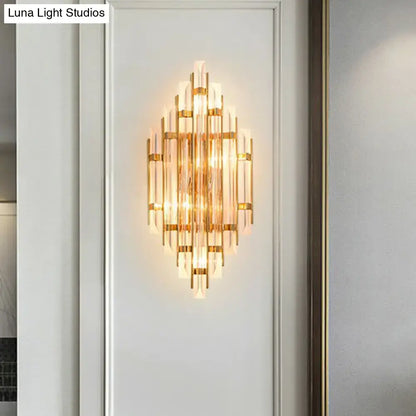 Minimalist gold wall sconce light with k9 crystal vertical glass rods and metallic frame for living room use