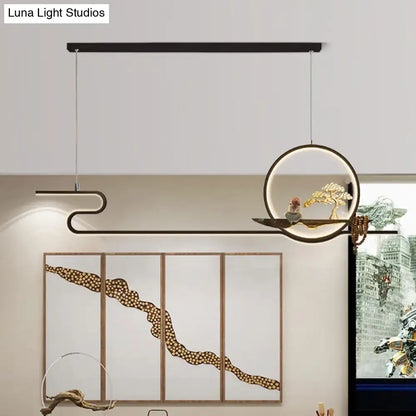 Modern black and gold linear hanging lamp with minimalist curved design and adjustable chain cord length for study rooms