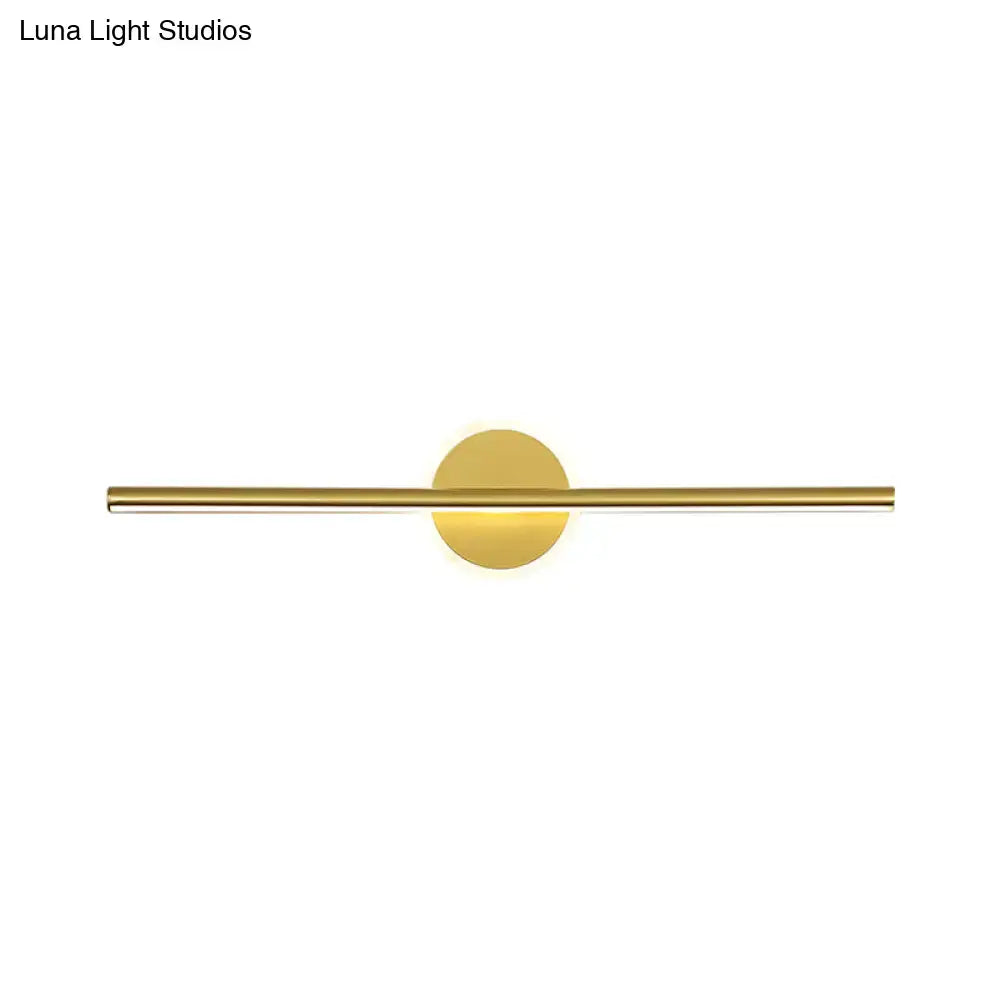Minimalist gold linear led wall sconce with a sleek horizontal bar and circular base modern wall sconce for bedroom vanity lighting